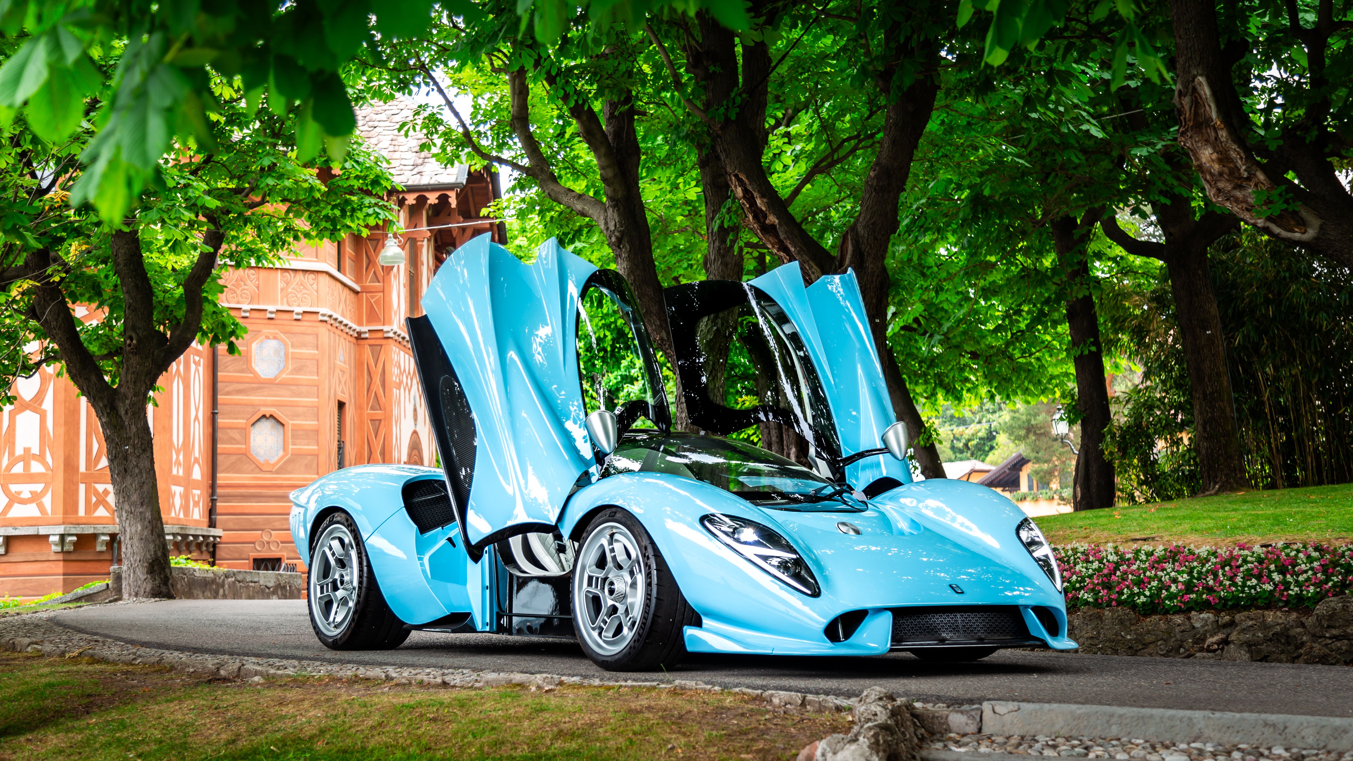 Light blue De Tomaso P72 with both doors open
